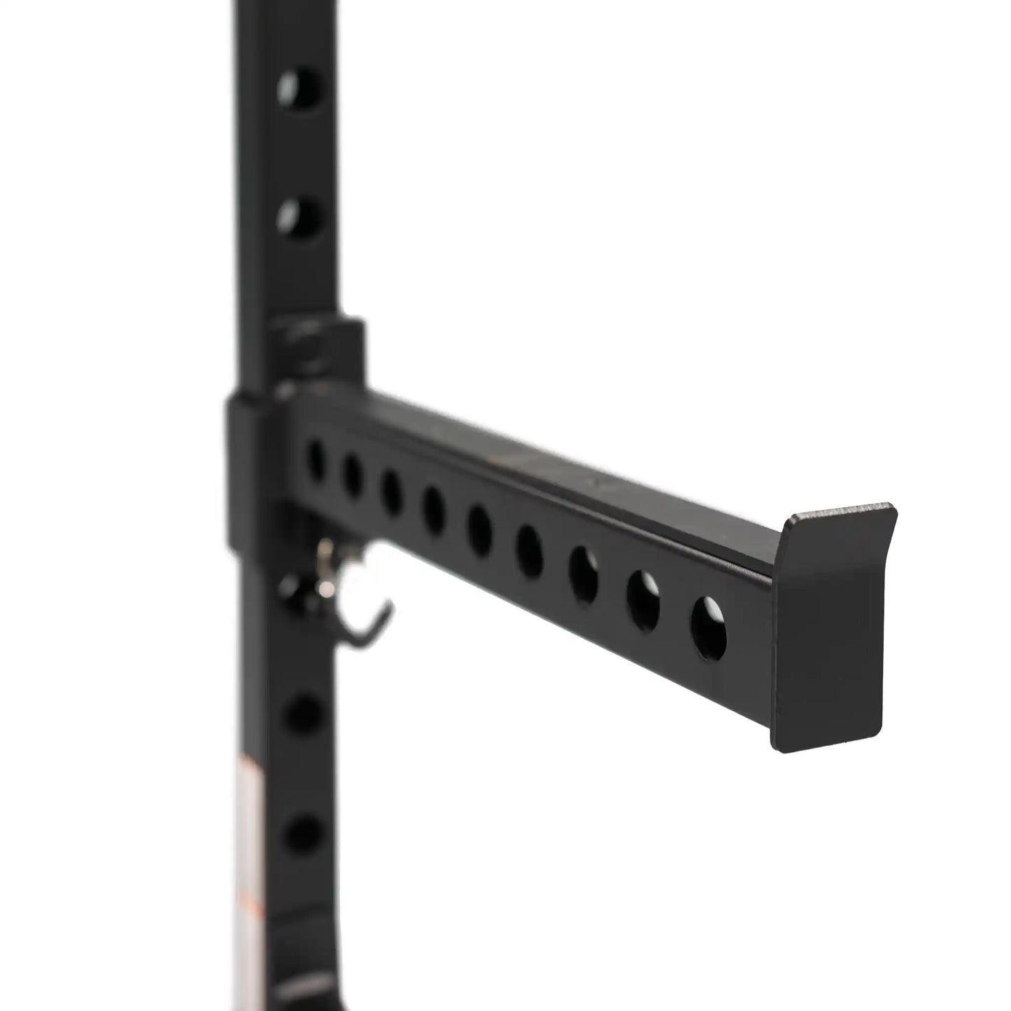Safety bar on black power rack