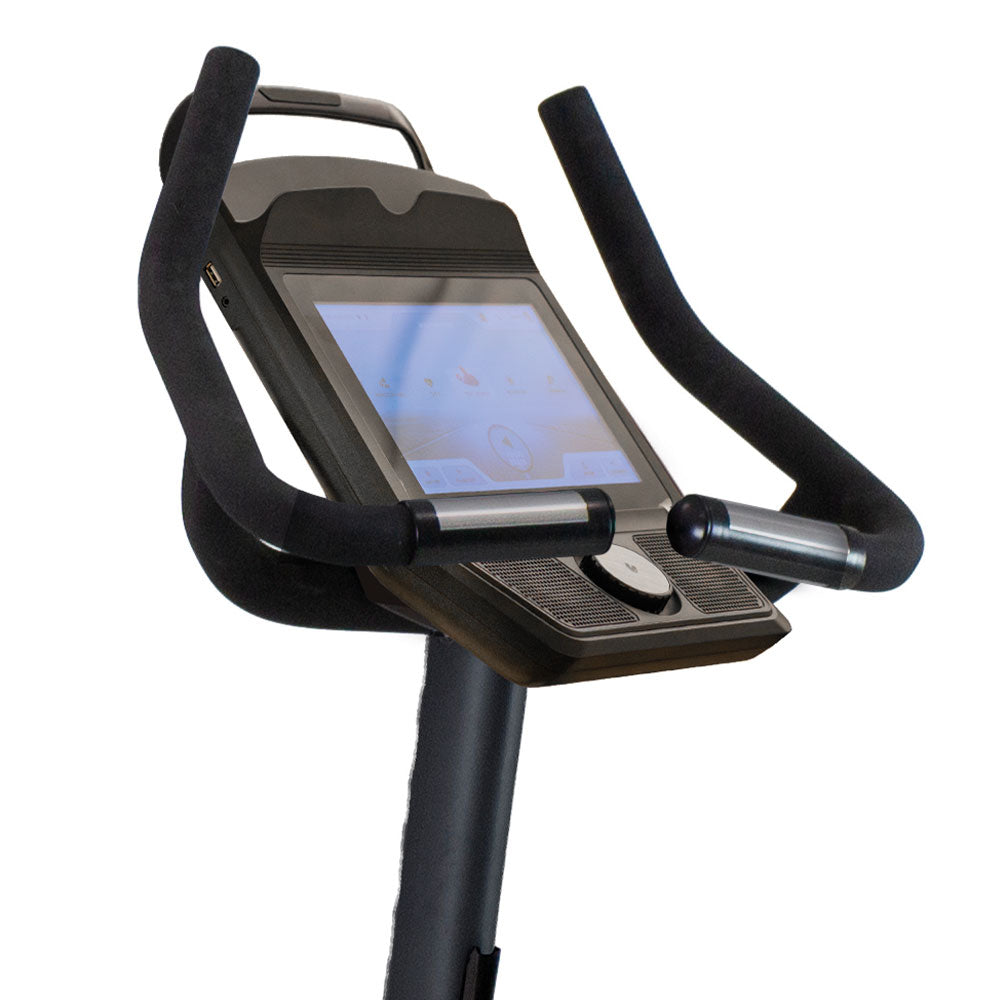 Close-up of a treadmill console with display and control buttons on a white background