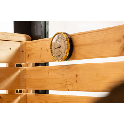 Wooden beam with a circular temperature gauge