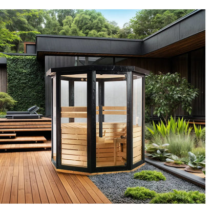 Outdoor hot tub with wooden interior and black exterior in a garden setting.