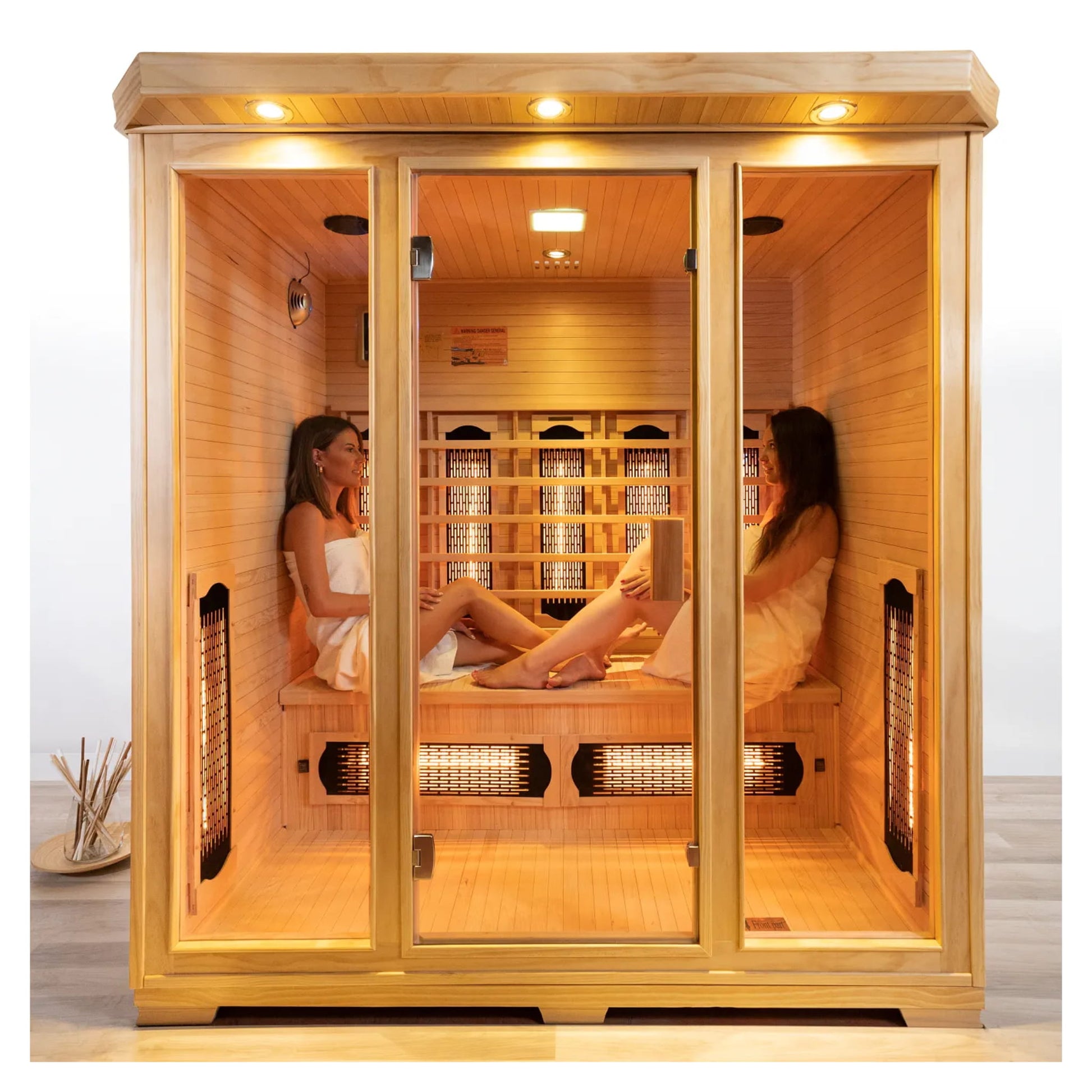 Two ladies in a wooden sauna