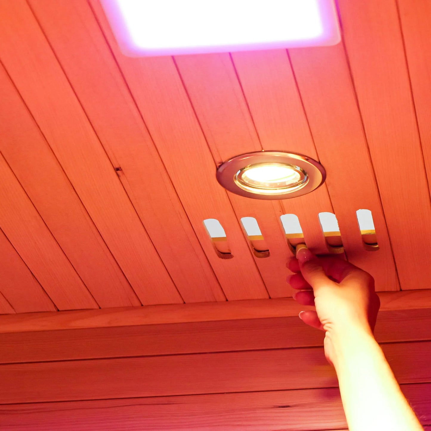 Person closing sauna vent 