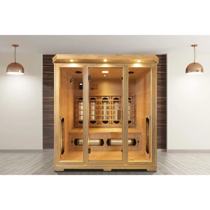 Wooden sauna in room with hanging lights either side