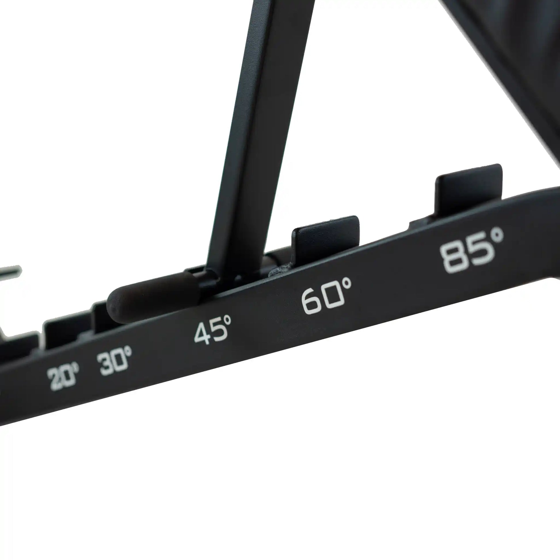 Frame of black weight bench showing degrees of angles it can be set at. 