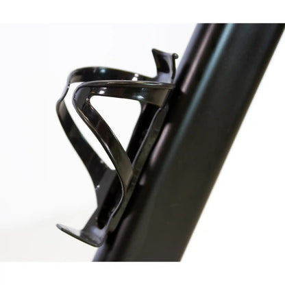 Black bicycle water bottle holder attached to a bike frame on a white background
