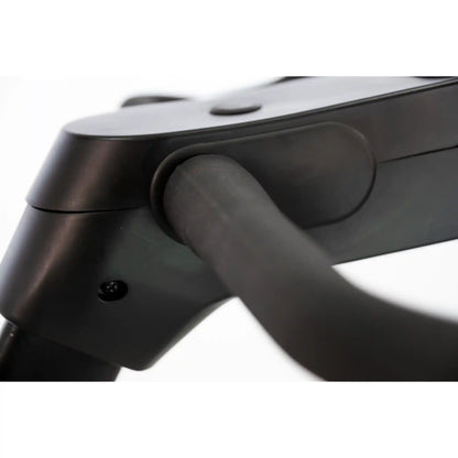 Close-up of a black bicycle handle bar post with a white background