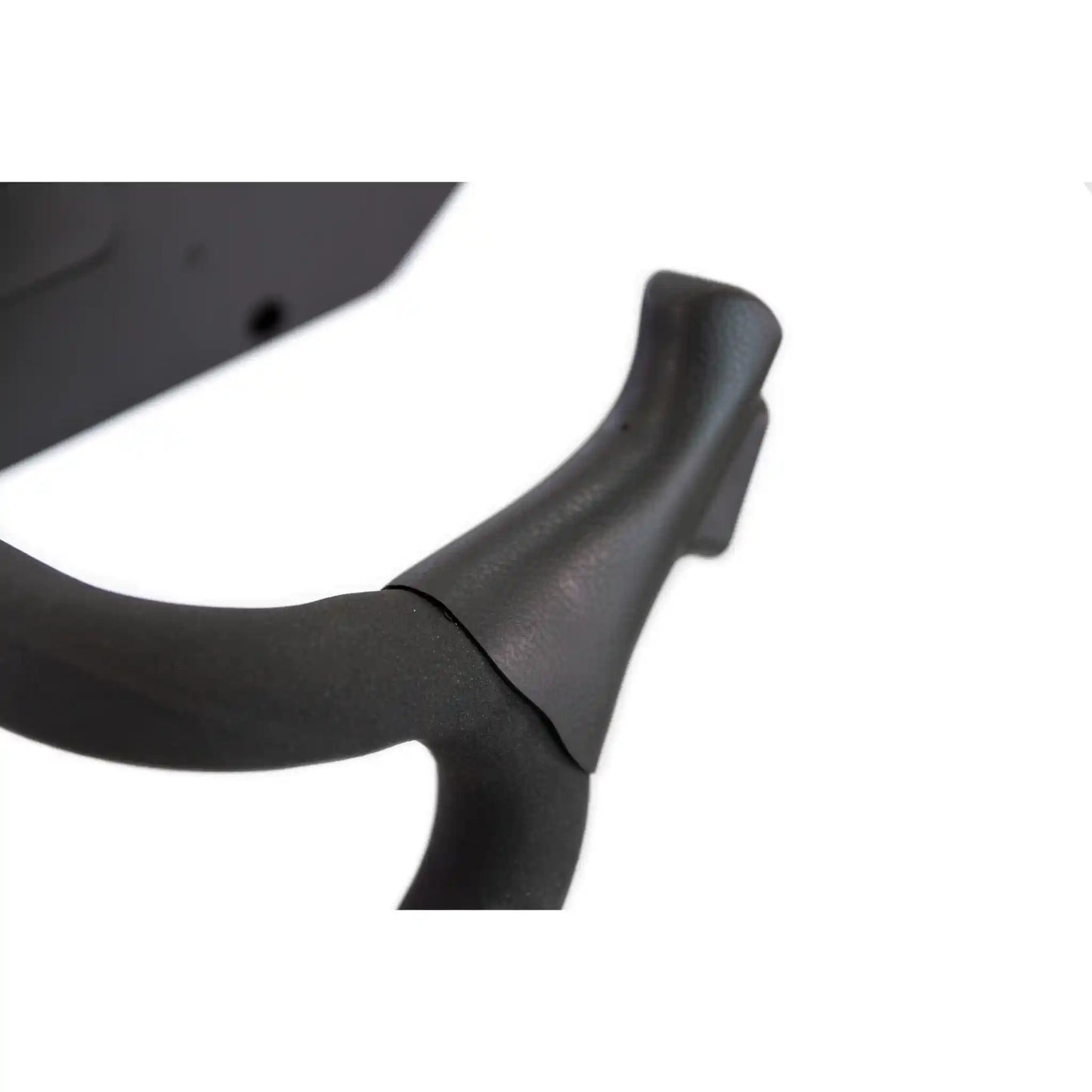 Close-up of a black handle bar on a white background