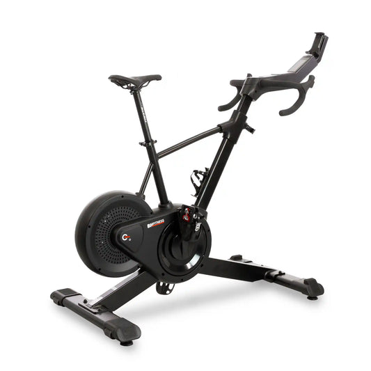 Black exercise bike on a white background