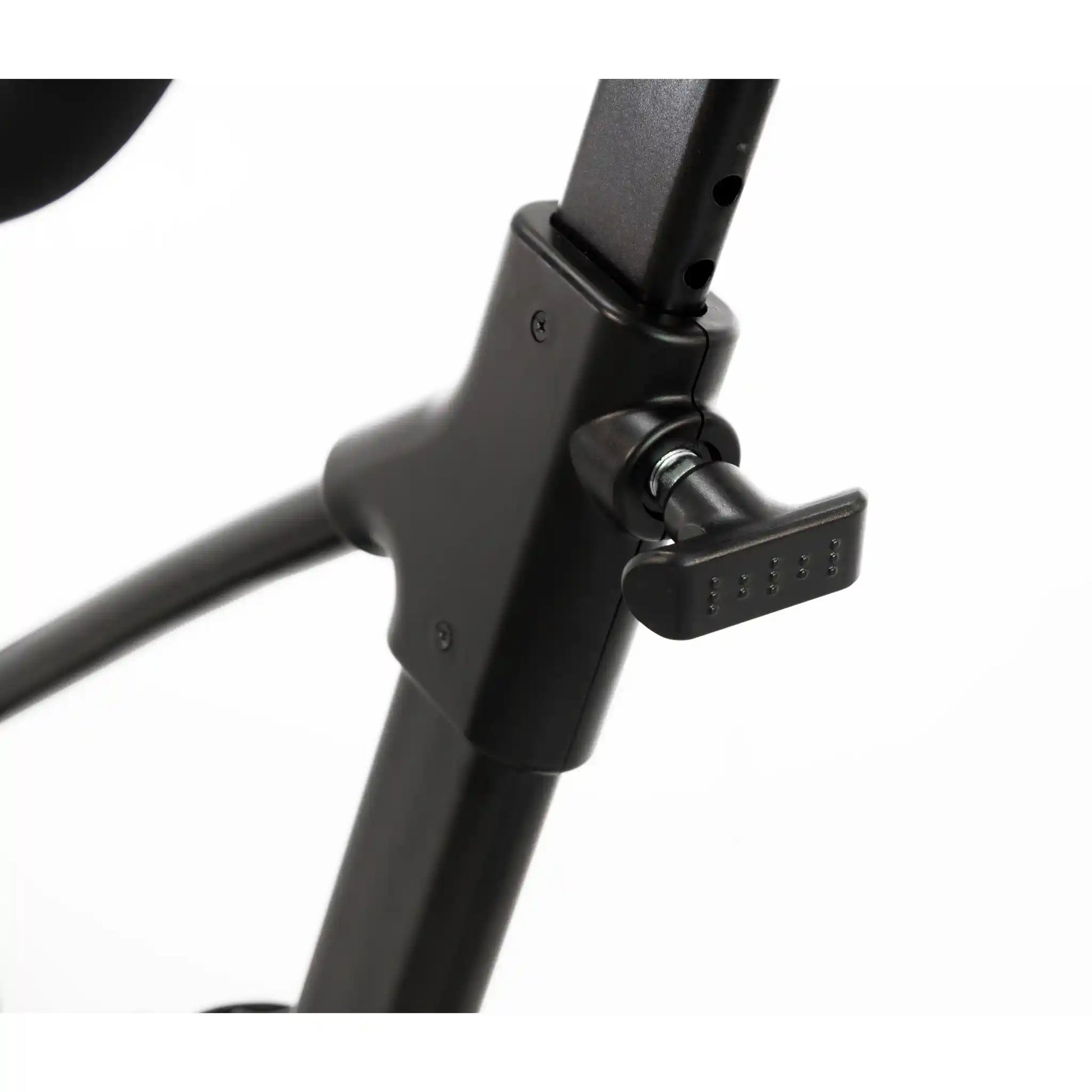 Close-up of a black adjustable exercise bike stand on a white background
