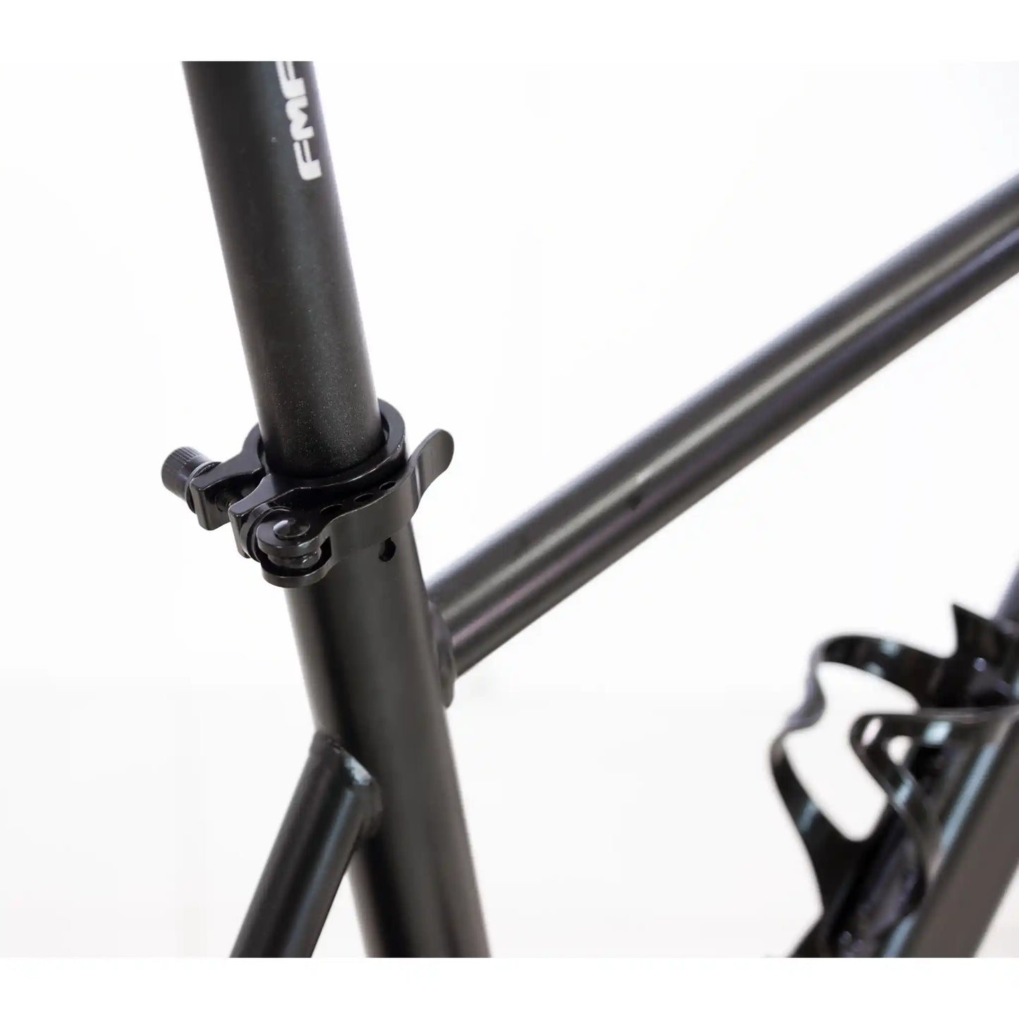 Close-up of a black bicycle frame with branding on a white background