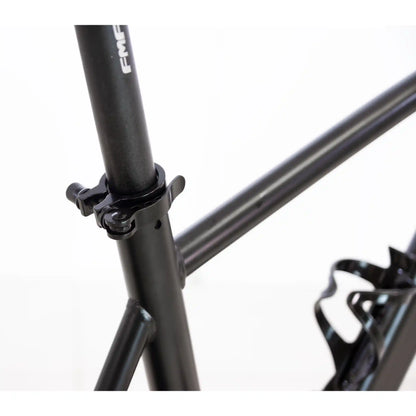 Close-up of a black bicycle frame with branding on a white background