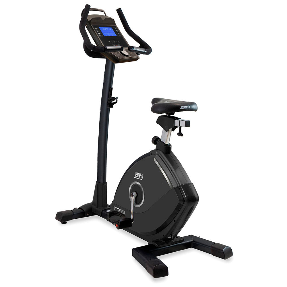 Black exercise bike with digital display on a white background