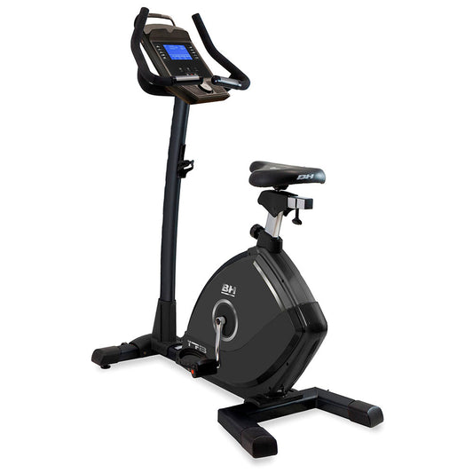 Black exercise bike with digital display on a white background
