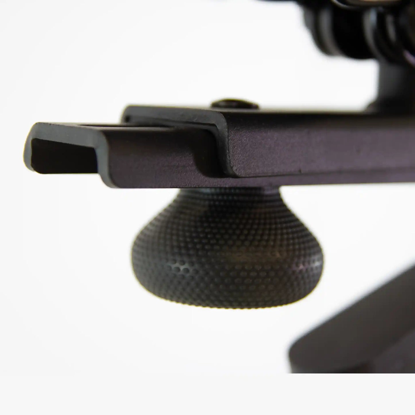 Close-up of a black seat adjuster white background