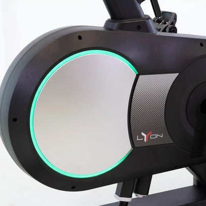 Close-up of a stationary bike with a visible brand logo on a white background