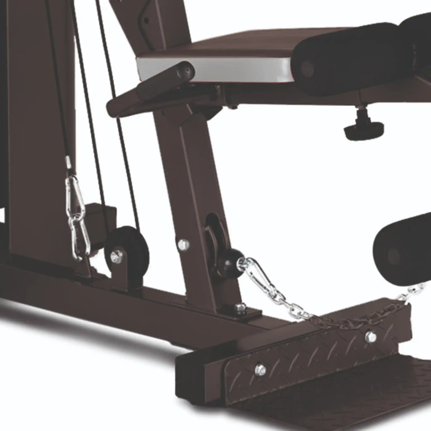 Close-up of a black exercise machine with metal components on a white background