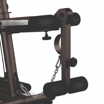Leg attachment on black gym machine on white background