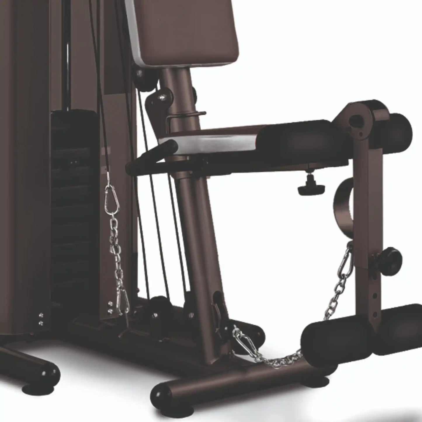 Close-up of a black gym machine with chains on a white background