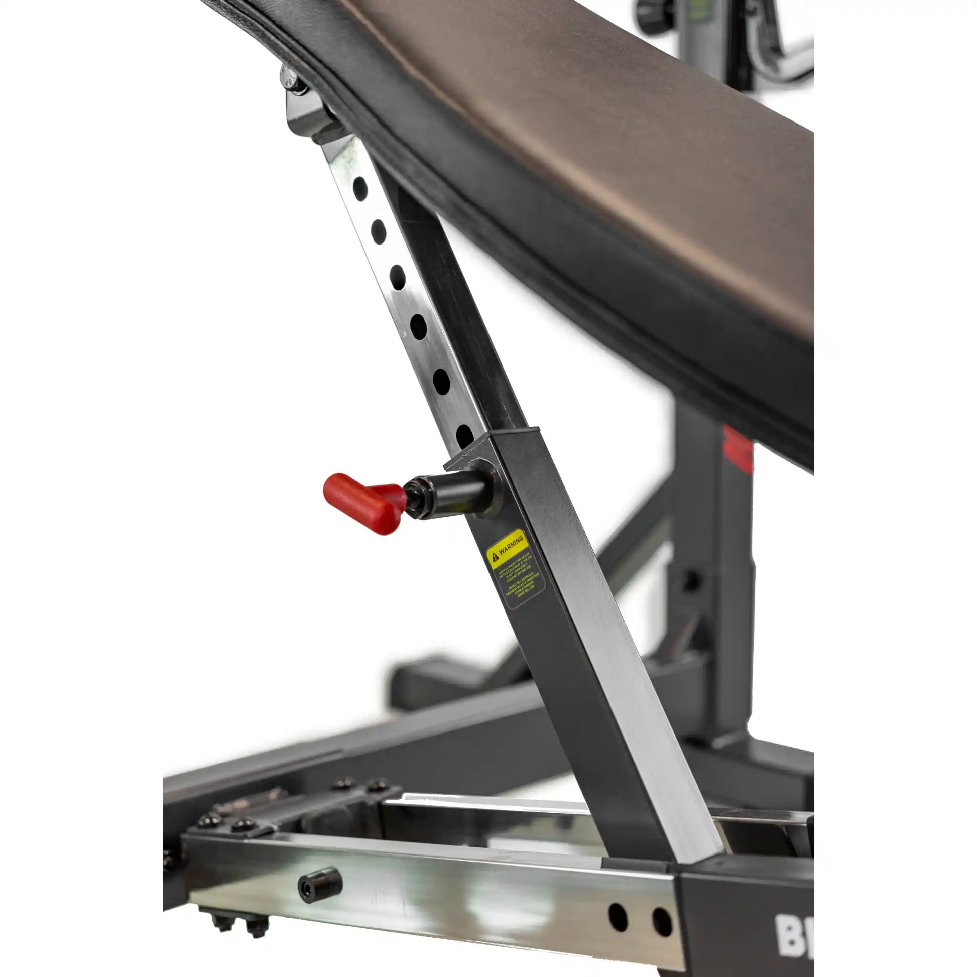 Close-up of a weight bench with adjustable backrest on a white background