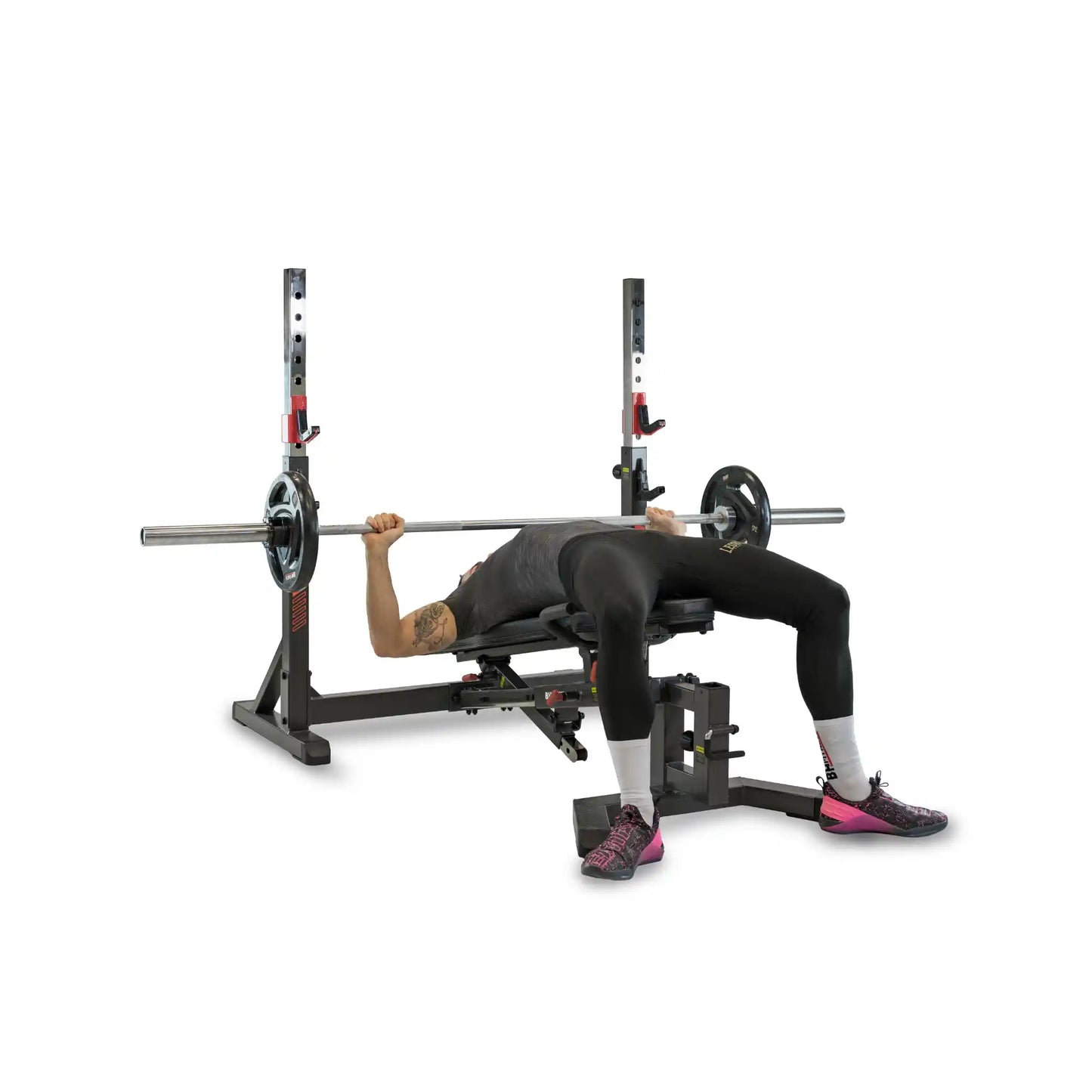 Person performing a bench press with a weightlifting bench and barbell on a white background