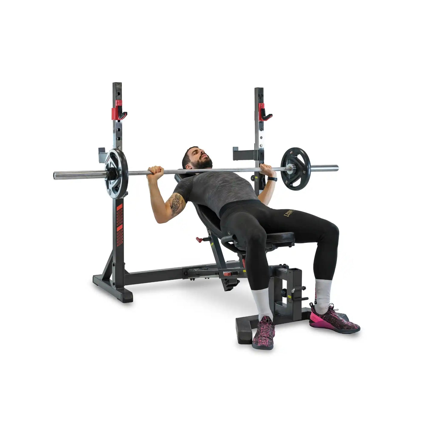 Person performing a bench press with a weightlifting bench and barbell on a white background