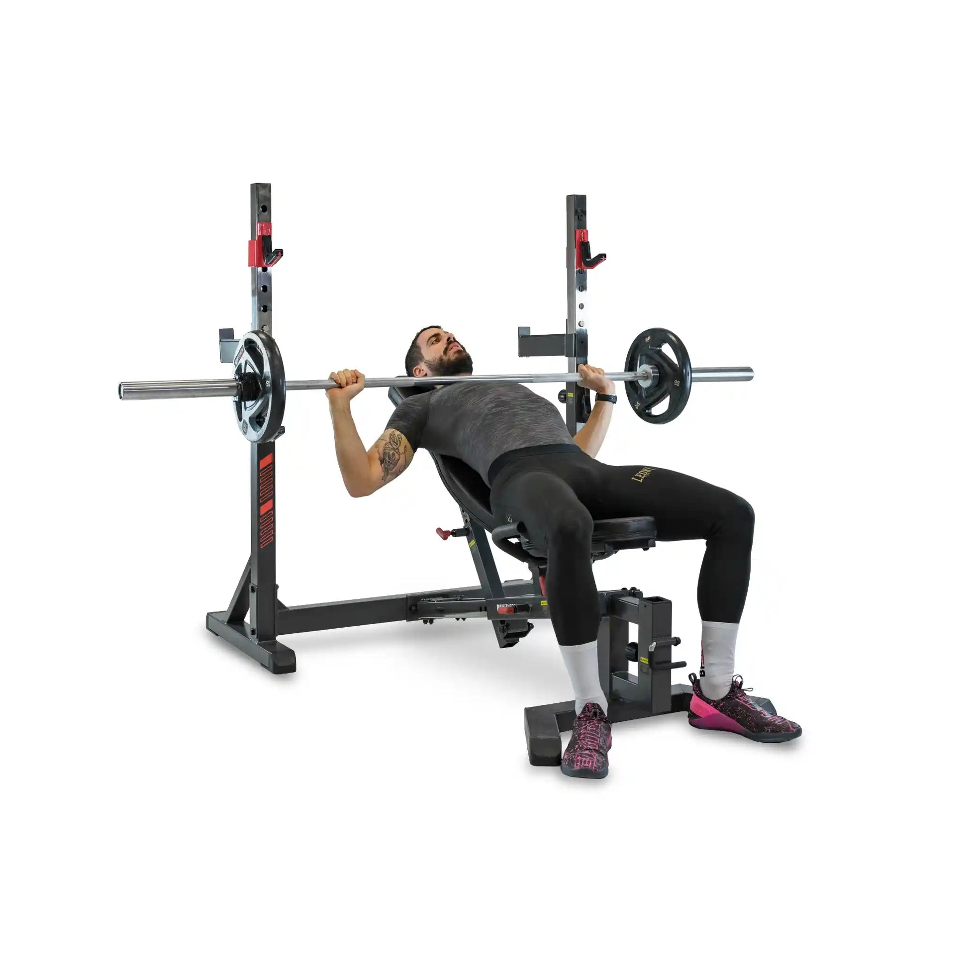 Person performing a bench press with a weightlifting bench and barbell on a white background
