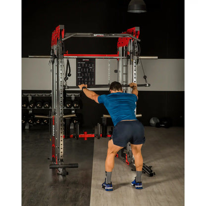 Person using a weightlifting power rack in a gym setting