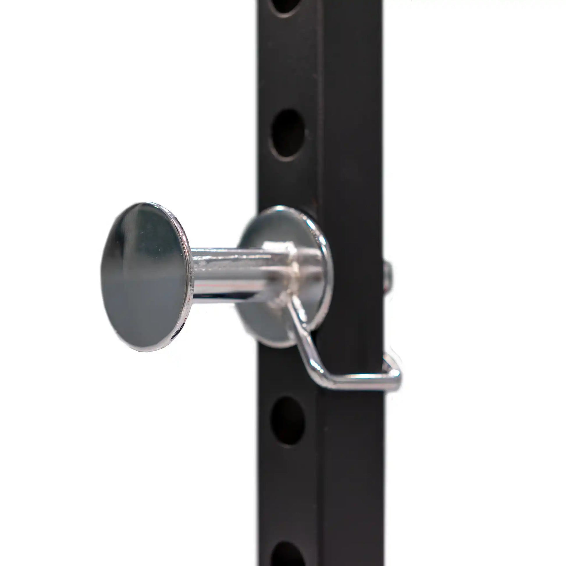 Metal lock mechanism on a black metal power cage frame