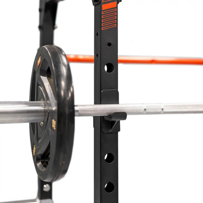 Close-up of a weightlifting barbell with weight plates on a white background