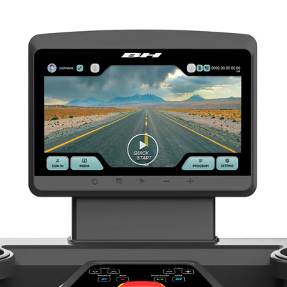 Multimedia display with a road scene on screen, featuring the brand 'BH'.
