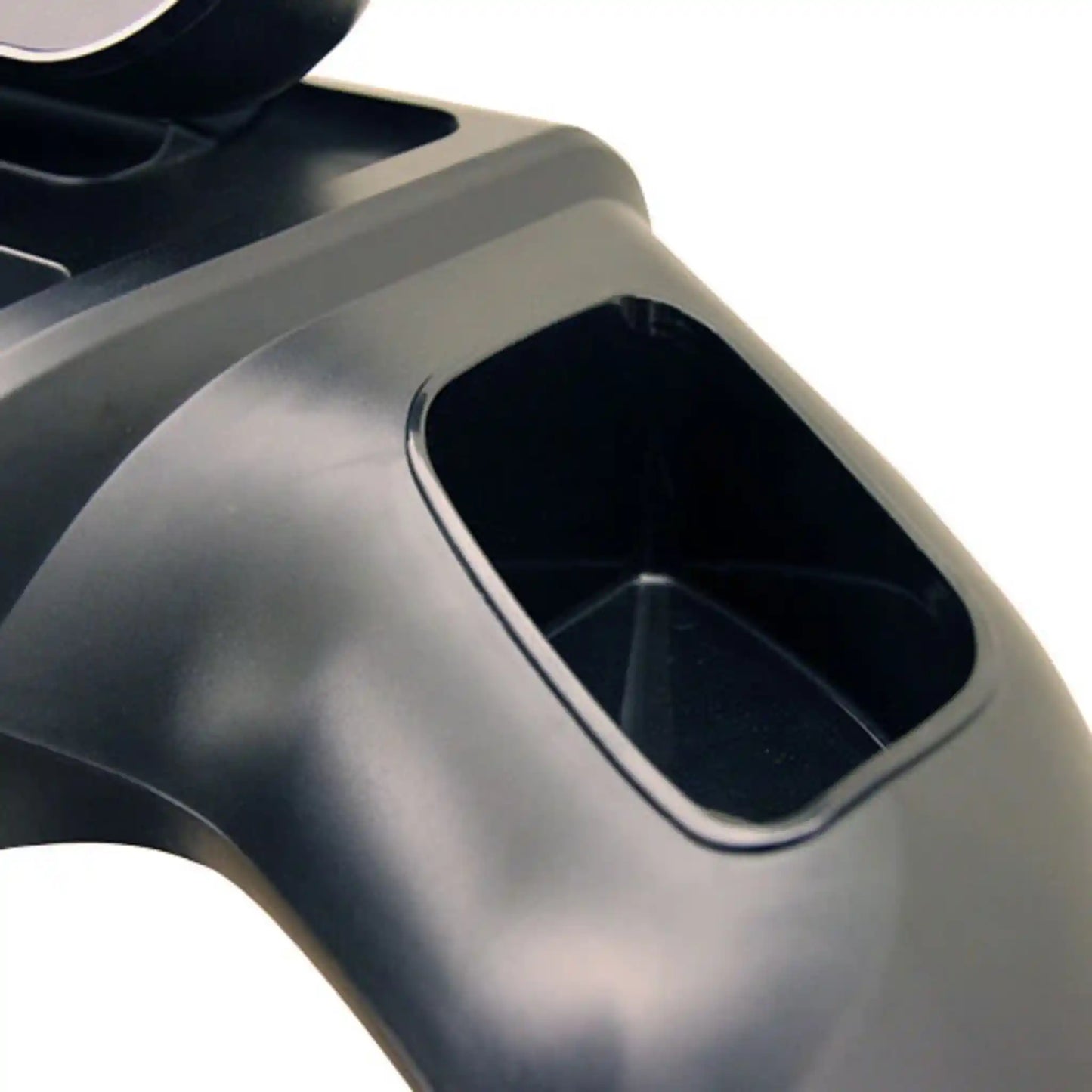 Close-up of storage space on a treadmill with a white background