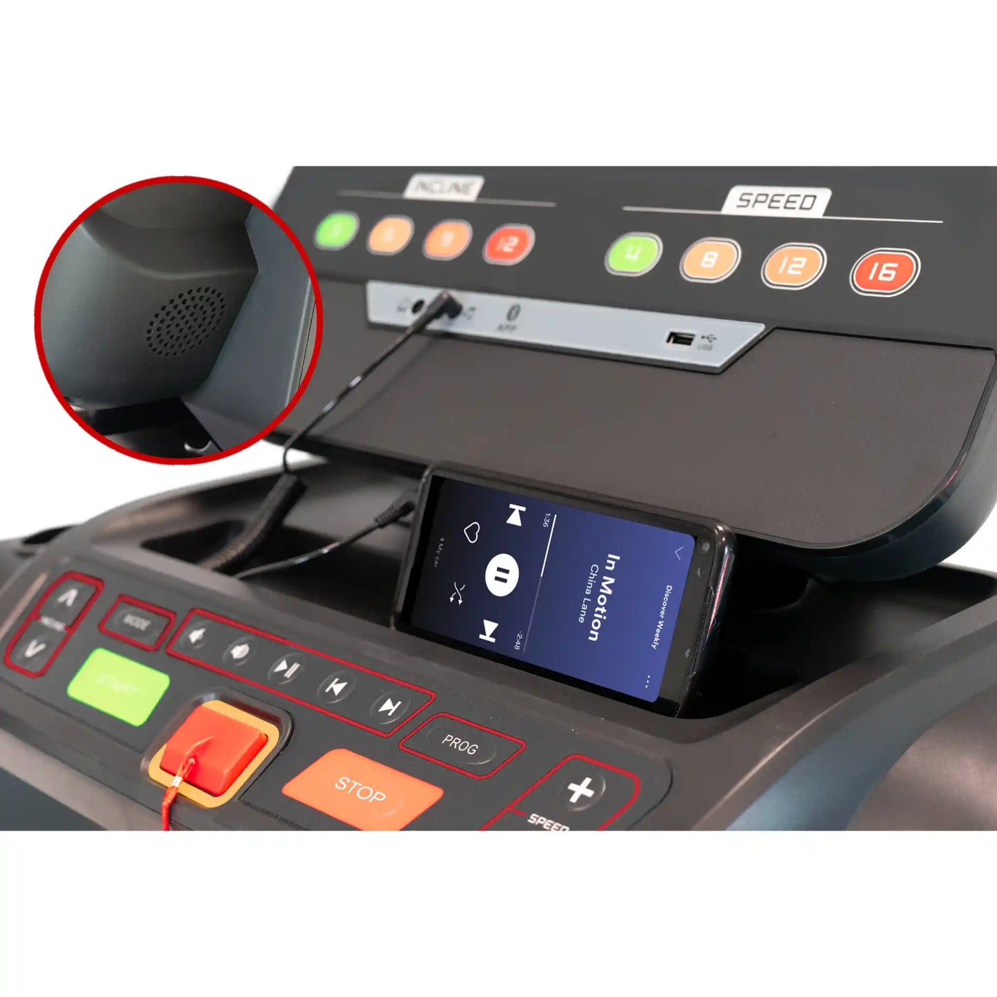 Treadmill control panel with smartphone dock and close-up of speaker grille.