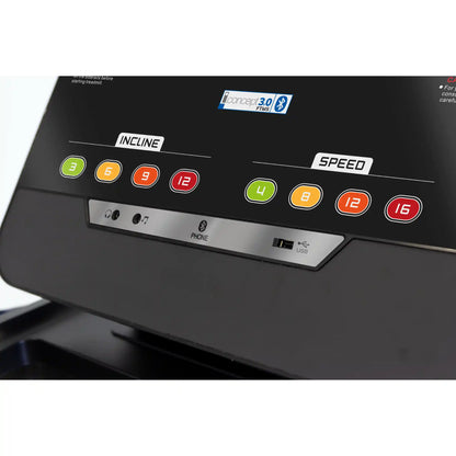 Control panel of a treadmill with incline and speed settings on a white background
