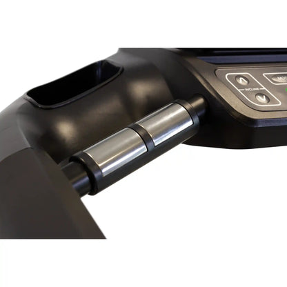 Close-up of metal sensors for hands on a treadmill with a white background