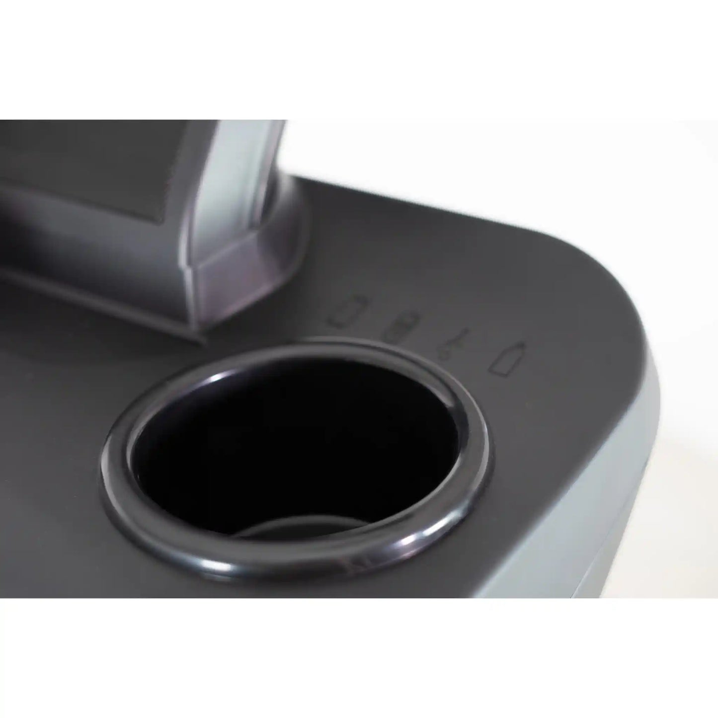 Close-up of a cup holder on a treadmill