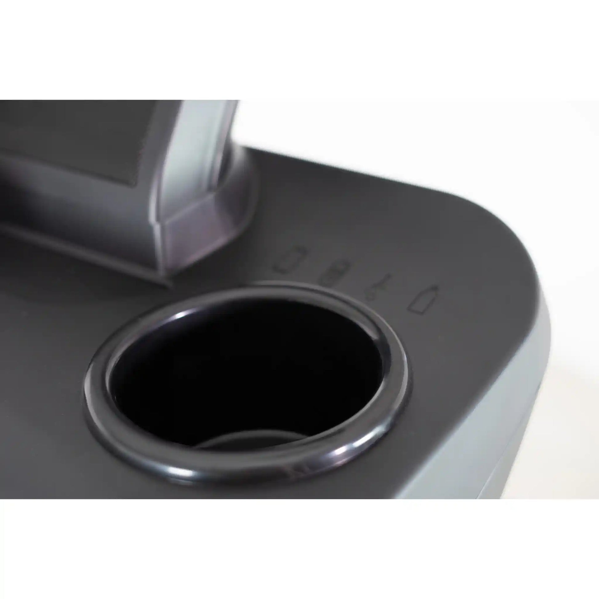 Close-up of a cup holder on a treadmill