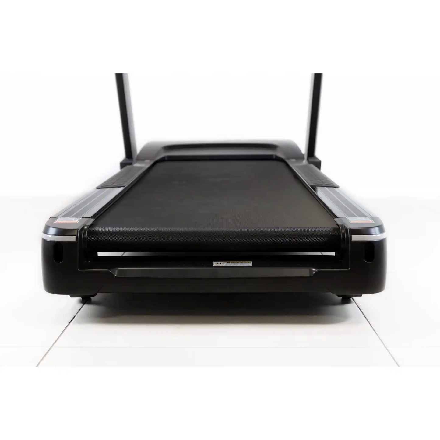 Black treadmill on a white background