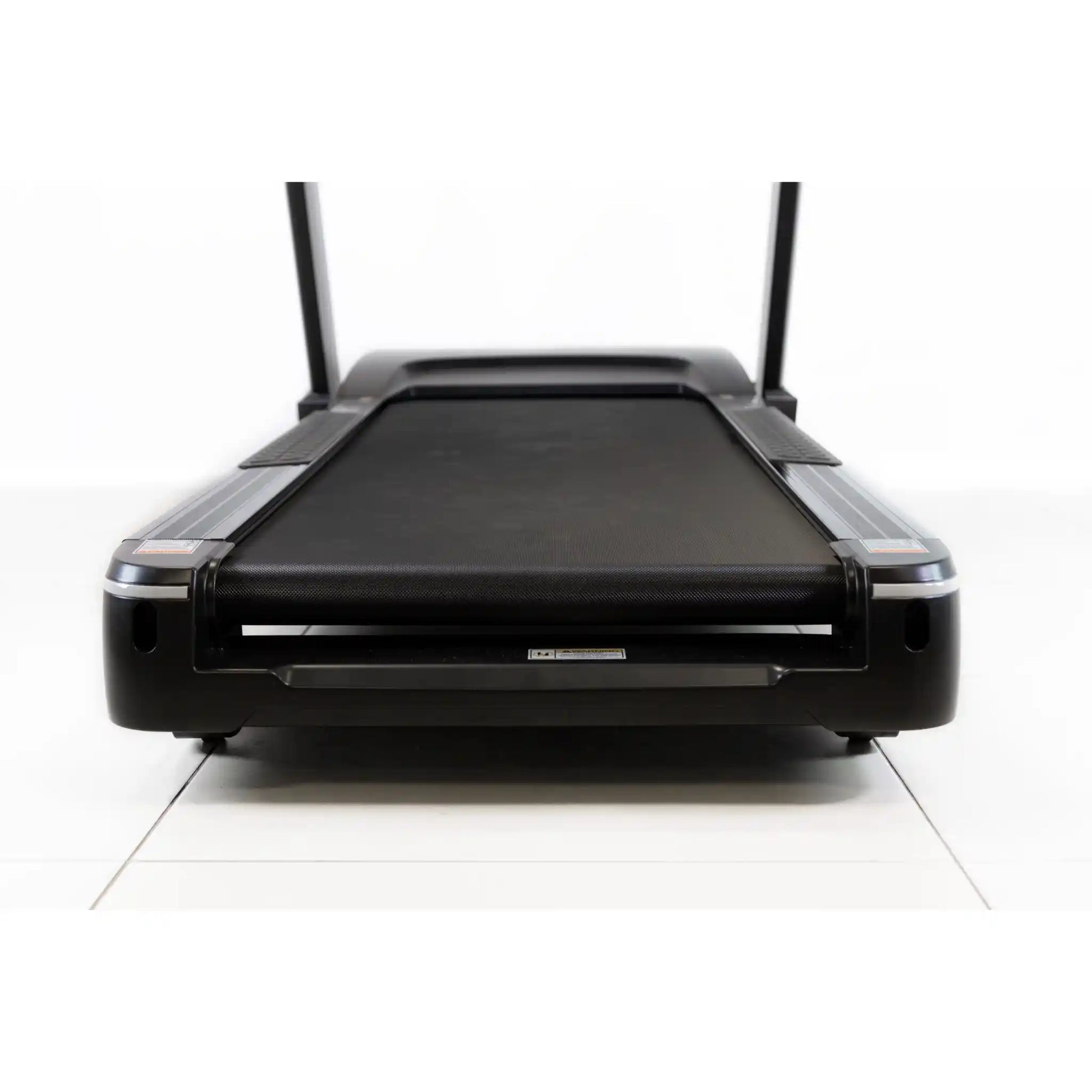 Black treadmill on a white background