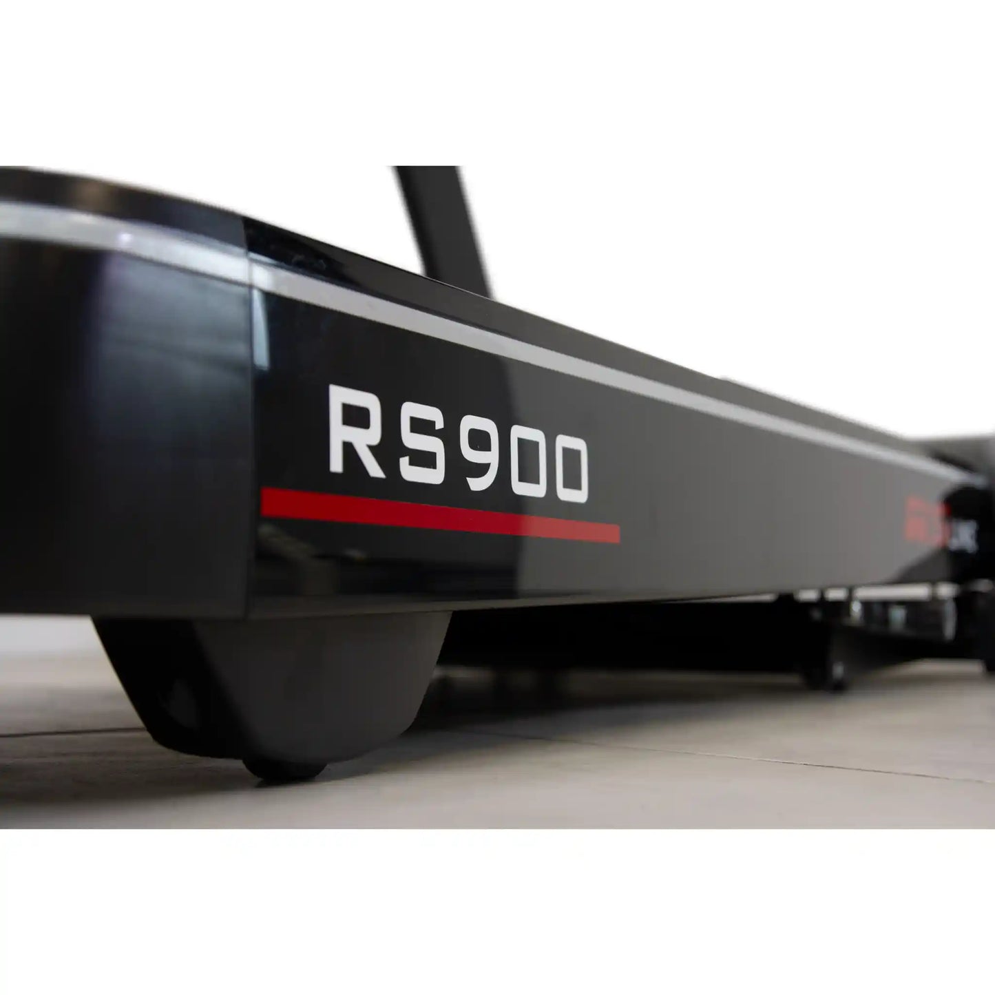 Close-up of bottom of treadmill with 'RS900' branding on a white background