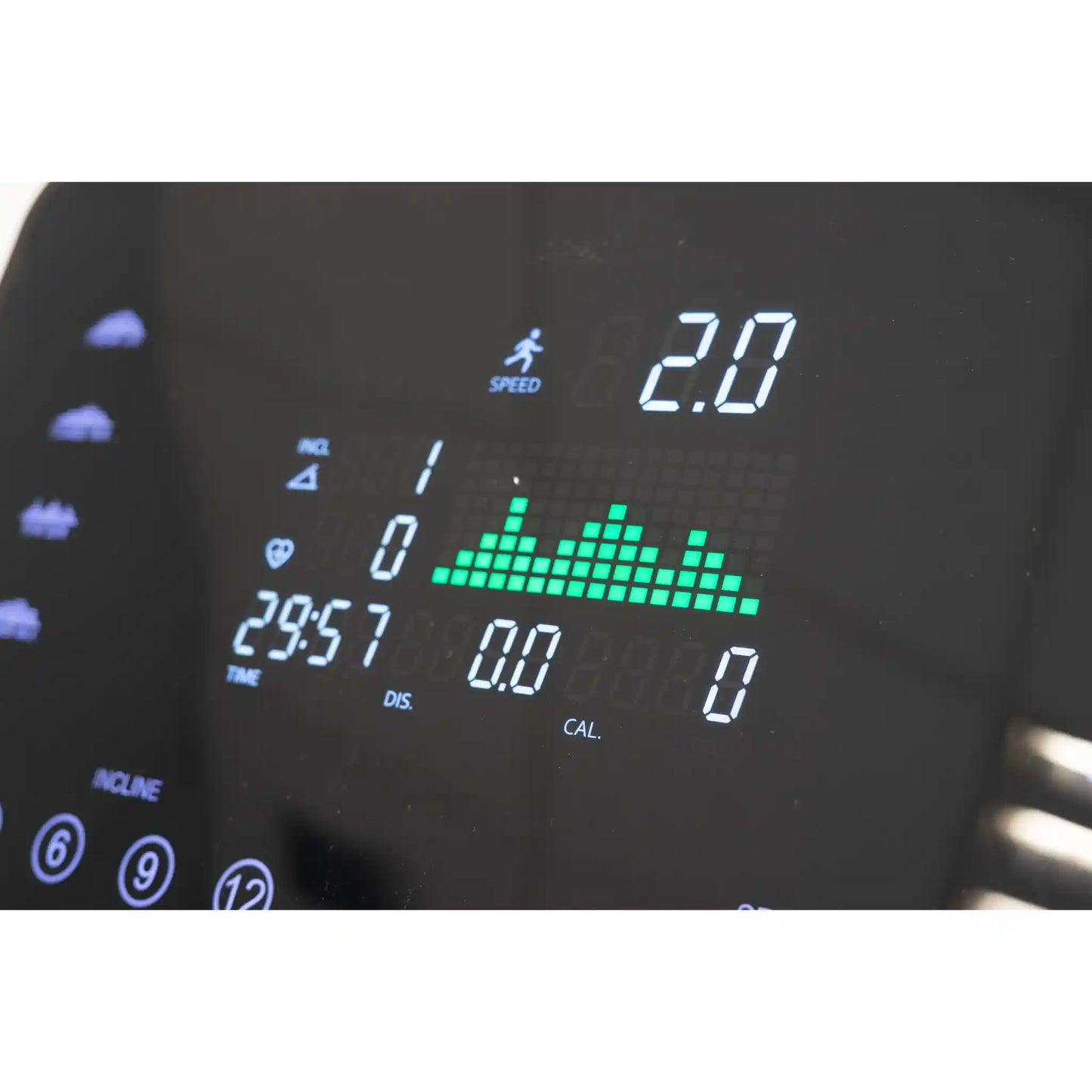 Digital display of a treadmill showing speed, time, distance, and calories burned.