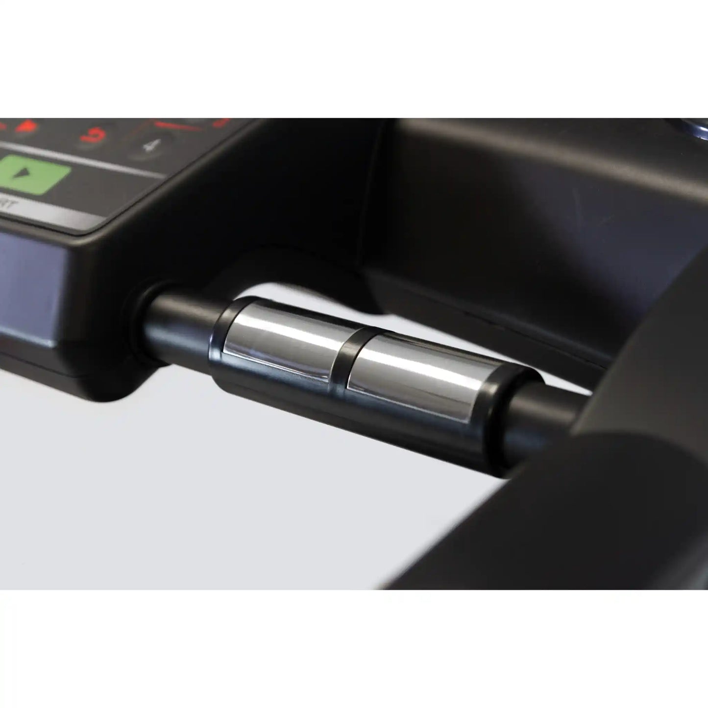 Close-up of metal sensors on atreadmill with a blurred background