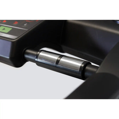 Close-up of metal sensors on atreadmill with a blurred background
