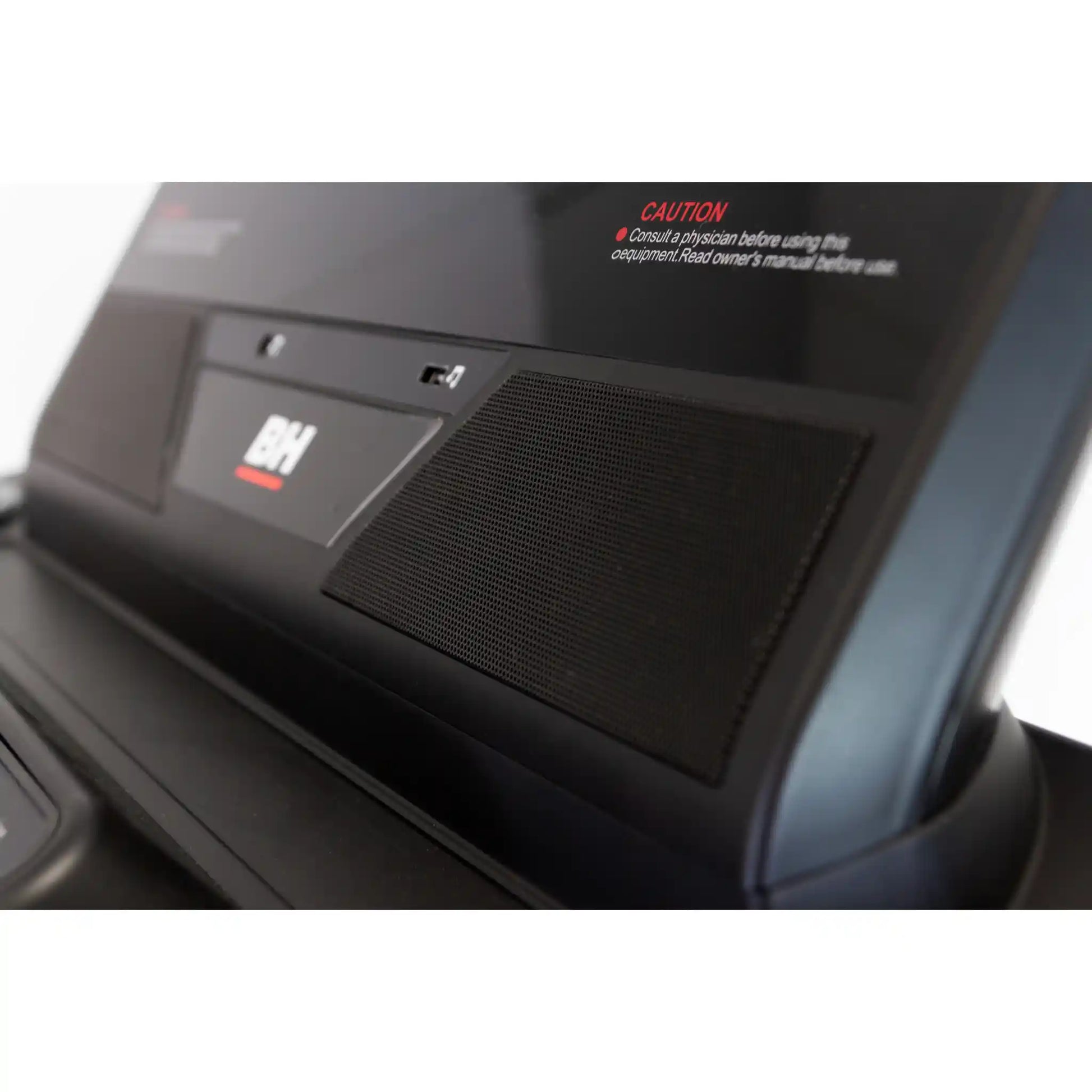 Close-up of speaker on a treadmill.