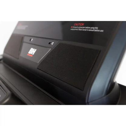 Close-up of speaker on a treadmill.