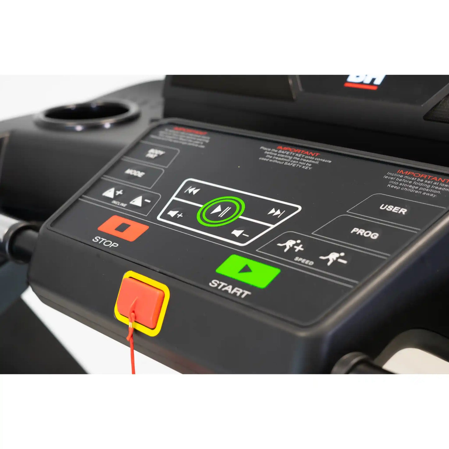 Control panel of a treadmill with various buttons and indicators.