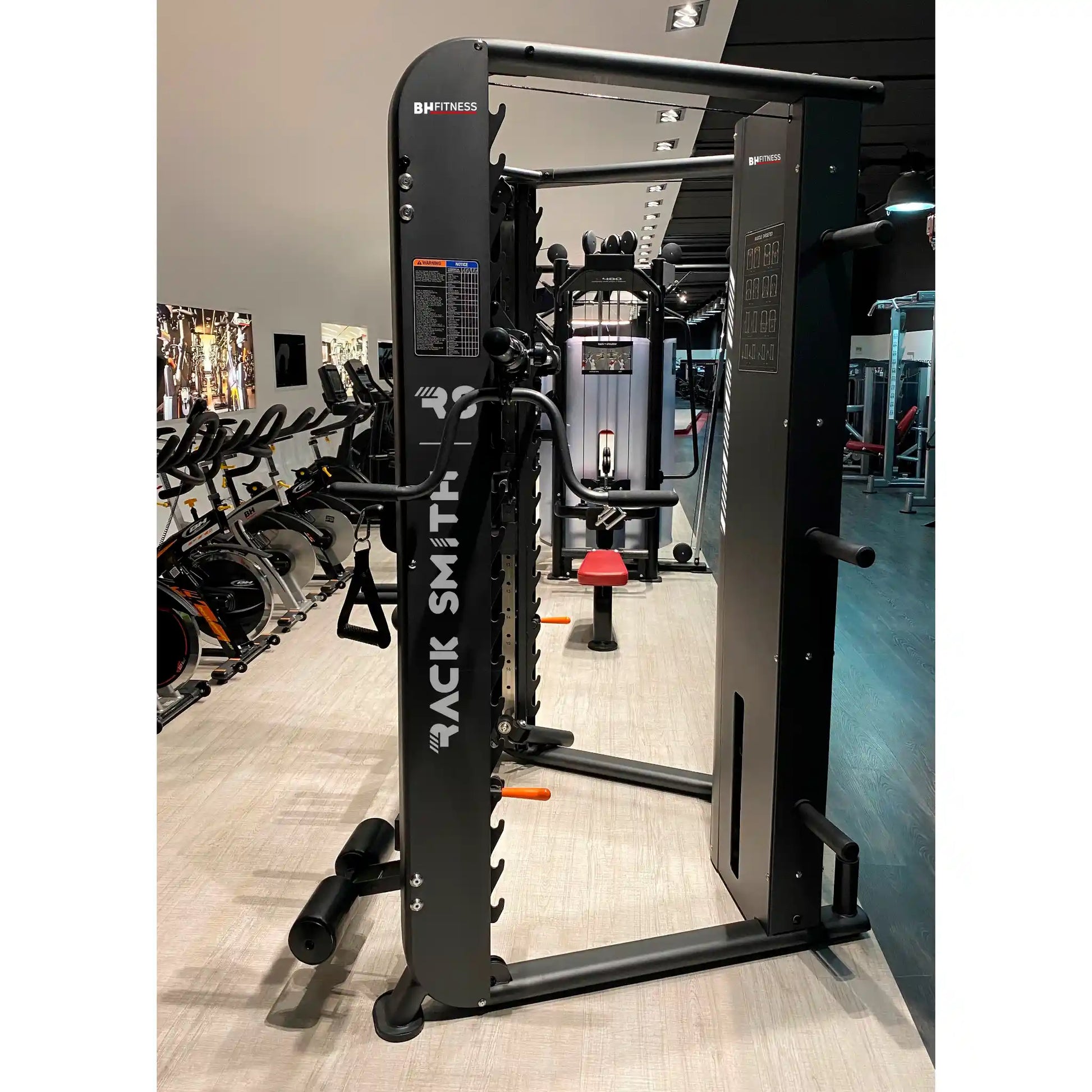 Gym machine with 'Rack Smith' branding in a gym setting