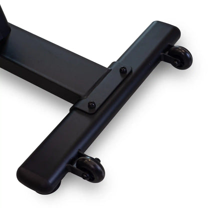 Black metal ground support structure for exercise bike on a white background