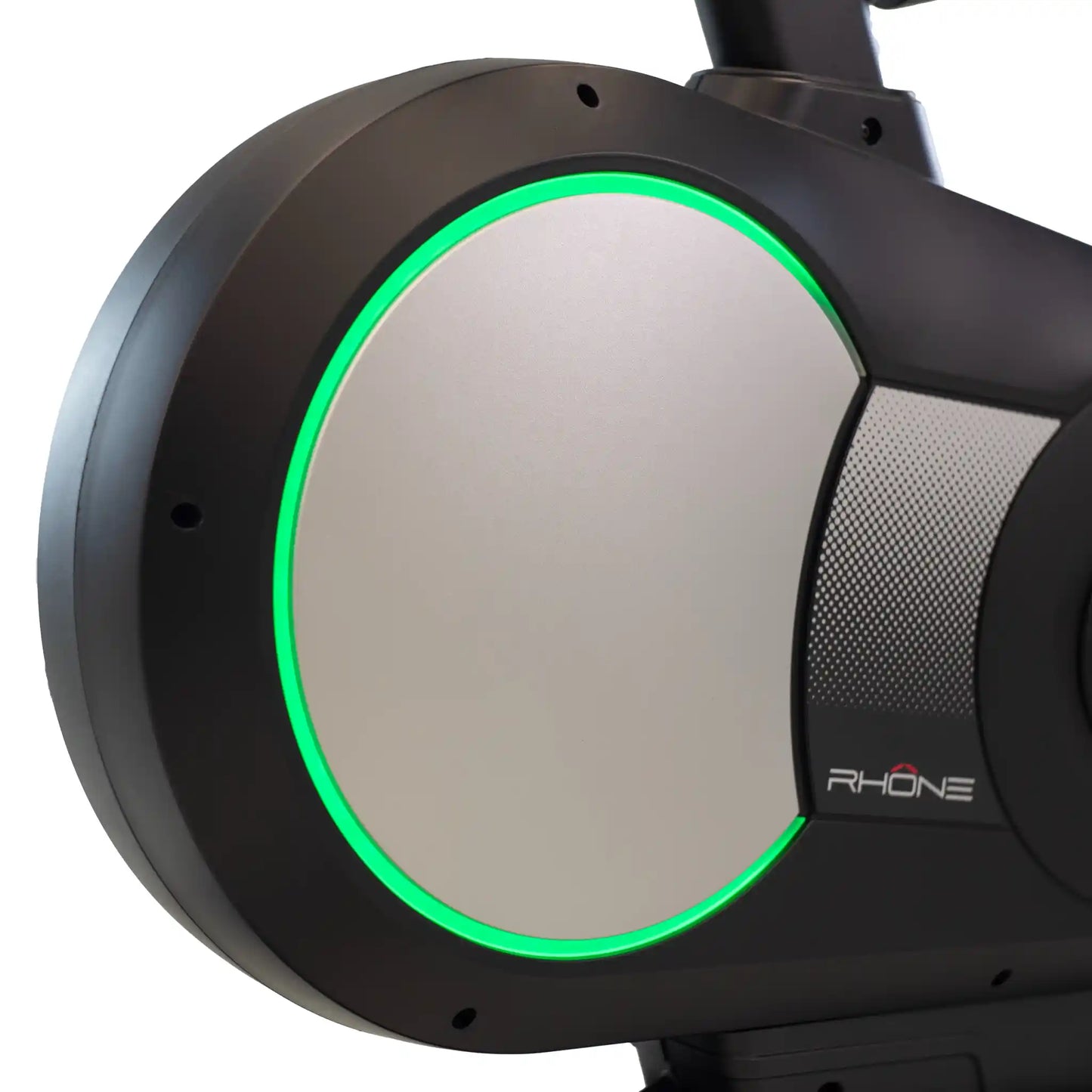 Close-up of exercise bike fly wheel with a green light on a white background
