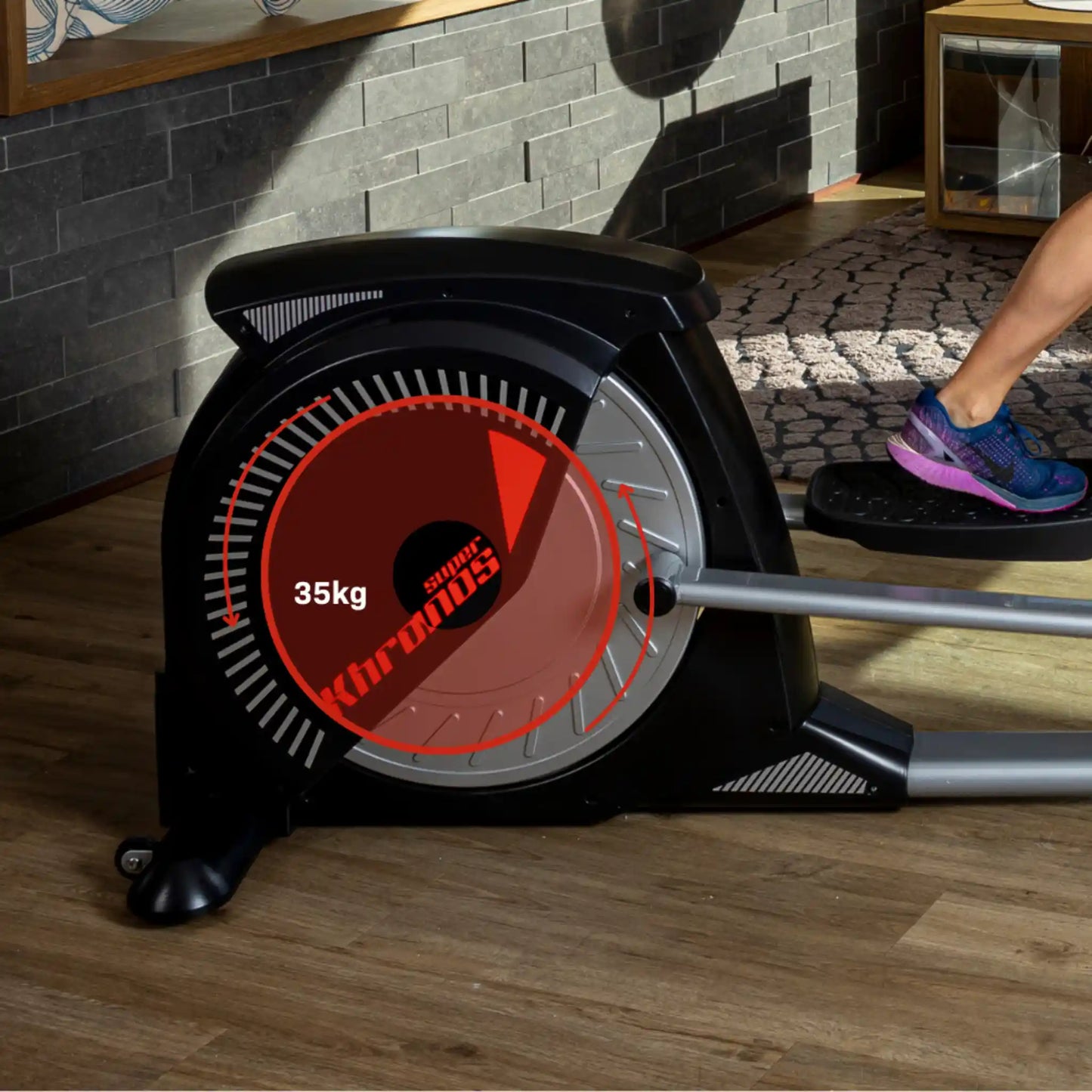Back of cross trainer on a wooden floor.