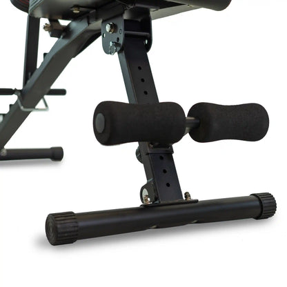 Close-up of a weight bench with adjustable footrests on a white background